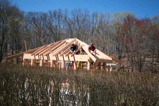 Jack rafters installed on either side of the hip rafter complete the roof framing.