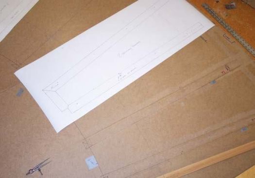 After drawing a full-size layout of the stair on the template, he makes patterns of the steel tread assemblies (above) and sends them to the fabricator.