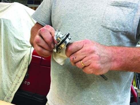 Using fresh towels with cleaner, wipe down the rest of the parts including the driver-piston assembly ...