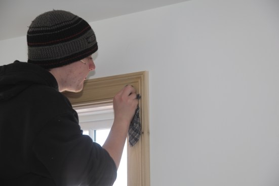 A damp rag removes any remaining glue from the joint.