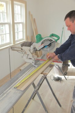  The length of the apron should be the same as the outside-to-outside measurement of the installed casing above. After cutting the return pieces off both ends, measure and mark the length from the long-point of the 45-degree angle cut.