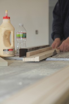 The carpenter adds a 5-degree back bevel on the top of the apron to let it fit tight against the underside of the stool. A back bevel isn't noticeable, but can make a huge difference on the way two pieces join together.