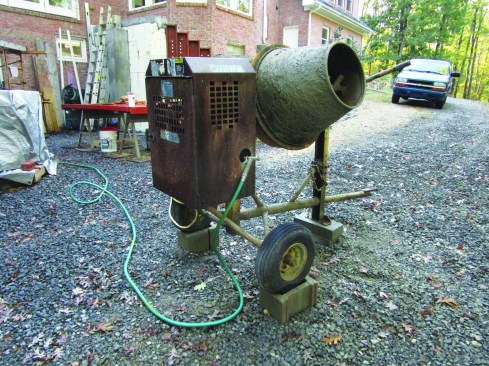 Mechanical mixers are a great way to mix small batches of concrete.