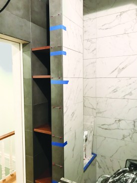 This ensured the tiles lined up in the corners where they met.