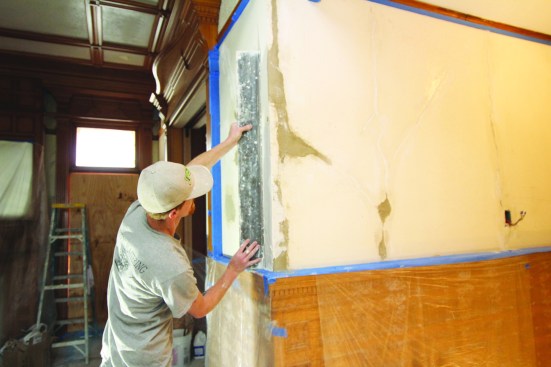 A 14-inch trowel and slicker are used and the texture is combed in.