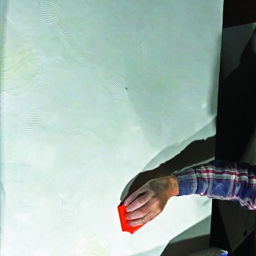 Ron Bisson uses a texture comb to mimic an existing swirl pattern.