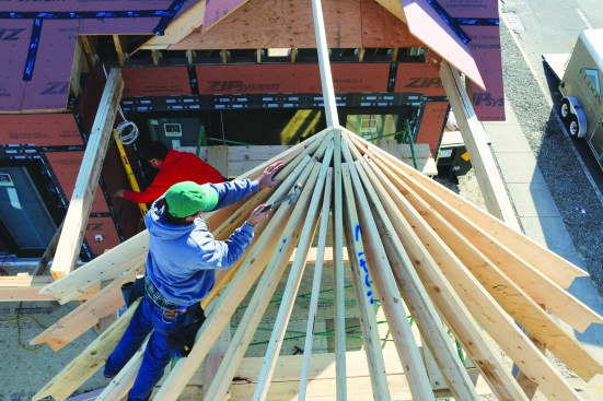 ... and taps down any uneven rafters to put them in the same conical plane.