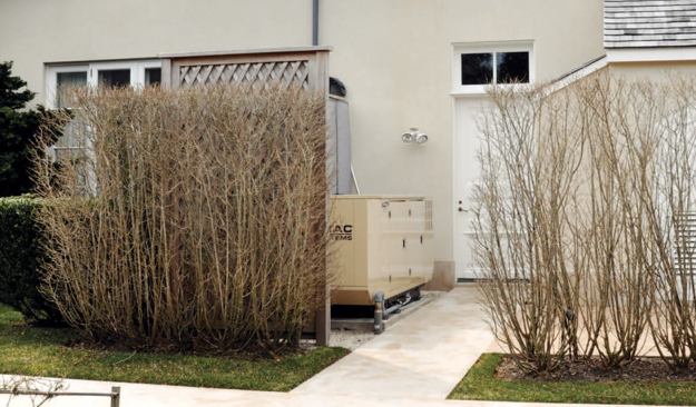 An attractive wooden screen lined with a sound-absorbing accoustic blanket helps control sound pollution.
