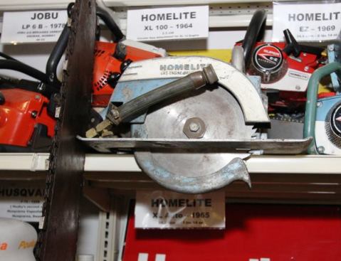 What is a circular saw doing up there with all those chainsaws? Well, it’s gasoline powered—a Homelite engine that can be converted from a chainsaw to a circular saw, pump, drill, or generator by connecting it to various accessories. 
Click here to find out more about the XL-100 saw (and see video of one in action).