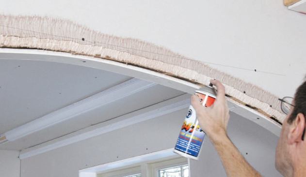 I fit the top arch beads first, fastening them in place with Trim-Tex 847 contact spray adhesive.