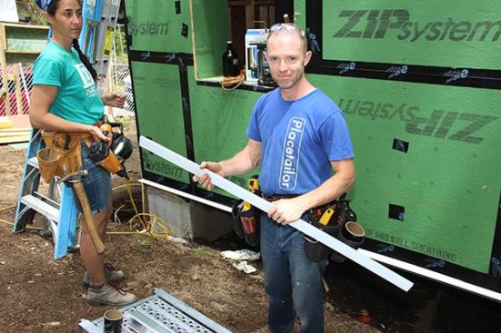 Project Manager Stephen Daly with a strip of corrugated plastic channel ripped for drainable strapping.