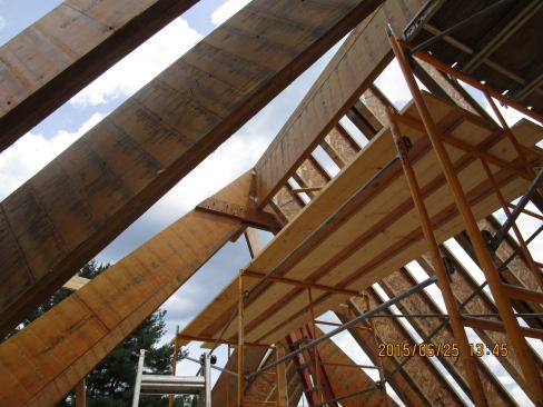 A view of the apex joint of the site-built truss system where the truss connects to the structural ridge.