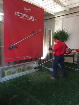 Cordless outdoor power equipment is a market you'll see all manufacturers expand and develop. Milwaukee is jumping into the game with a cordless string trimmer, hedge trimmer, and blower. The string trimmer, shown here, runs on M18 Fuel line. It has variable speed trigger, with low and high modes, and has instant throttle response so as soon as you pull the trigger, it goes. Cutting capcity is 14-16 inches, and Milwaukee offset the guard which they believe will eliminate build-up that's common with string trimmers. It's designed to cut thick brush and made quick, easy work of it during their demonstration. These are expcted to be released in the fall; pricing was not available.