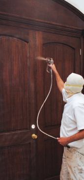 Three to four coats of CAB acrylic lacquer are sprayed onto the entire assembly, with a light sanding between coats.