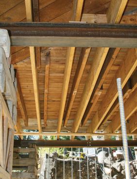 The author's crew reinforced the existing underframed floor system with full-span LVLs.