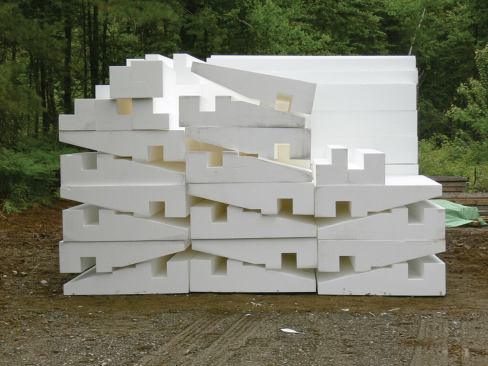 Custom-manufactured polystyrene served as the form system for the home's 8-inch reinforced "raft slab." The pieces were factory-cut with interlocking profiles.