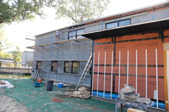 Foreground: Rainscreen Siding. Background: Cosella Dorkin – Delta Dry Stucco & Stone drainage mat for Stucco.