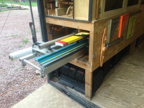 The space below the lumber cubbies contains a metal brake and shelves for a 10-foot Stabila Plate Level and other long items such as pipe clamps and drywall bead. The brake is set up like a stretcher: pull it out and the legs will swing down a pair at a time. Lock them in place and you are ready to roll the break to wherever it is you’ll be using it. To put it away, simply reverse the operation.