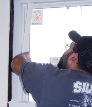 After opening and closing the window a few times and checking that the sash tilt out properly, I push up the top expander until it's about 1/4 inch from the existing jamb (to leave a gap for foam), then snap in the guide sleeve that covers the top screws.