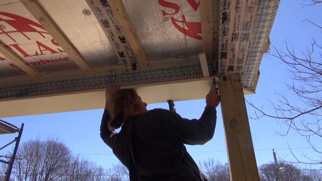 Care was taken to not interrupt or puncture the air barrier at the front porch beam.
