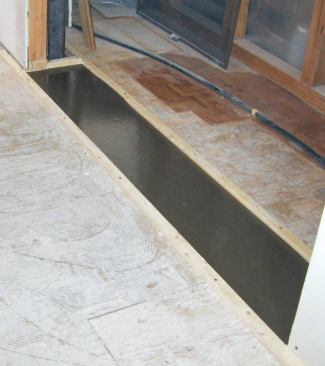 Fire doors can be ordered with automatic neoprene door bottoms, which seal against the floor when a plunger on the door’s edge comes in contact with the jamb.