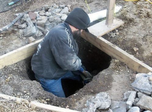 After locating all the footings, I generally dig the holes by hand.