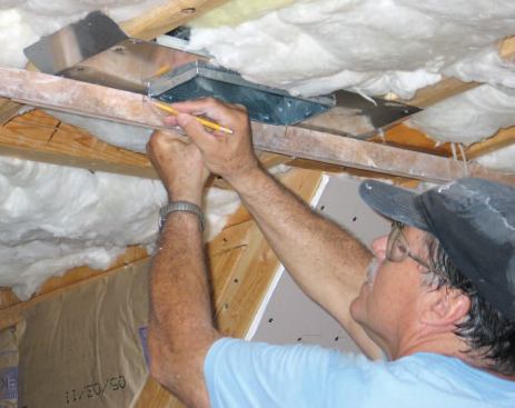 The story pole is used to record the location of openings that had to be cut into the panels.