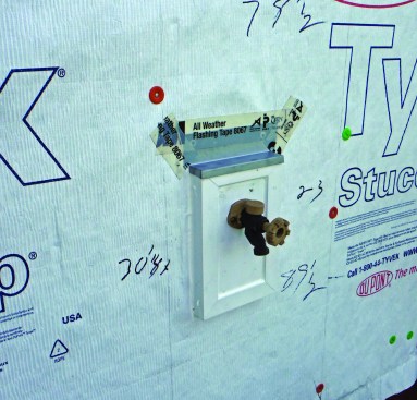 Detail through-wall penetrations with a standoff block. Ideally the block should be flashed and the cap flashing integrated into the weather barrier, as shown here.