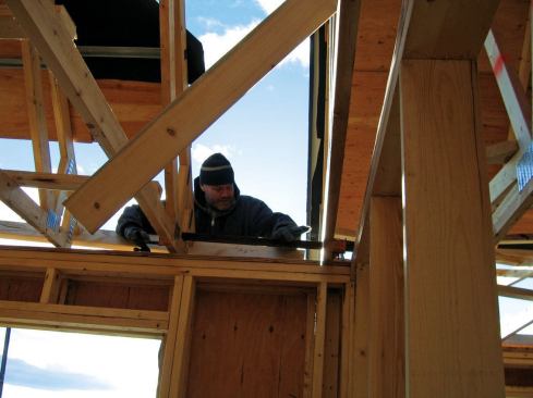 By 2:30 p.m. the cranes were finished and we set about doing final tweaks with come-alongs and pipe clamps. We nailed hurricane clips to the inside and called it a day, after celebrating with a tiny fireworks display.