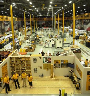 The factory 
occupies 65,000 square feet and is surrounded by 1.2 million square feet of warehouse space. The areas are separated by floor-to-ceiling storage racks, which had banners hung over them for the media event. This was probably done to provide a better looking backdrop for the media event and to obscure the gazillions of pallets of SB&D products stored in the distribution area.