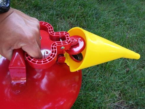 Opening the Eagle Safety Can is a matter of pulling back on the plastic handle.