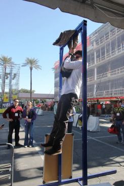 This guy is hanging from a pair of Blaklader pants to show how tough they are. Participants were given a tshirt that's too tasteless to be shown.