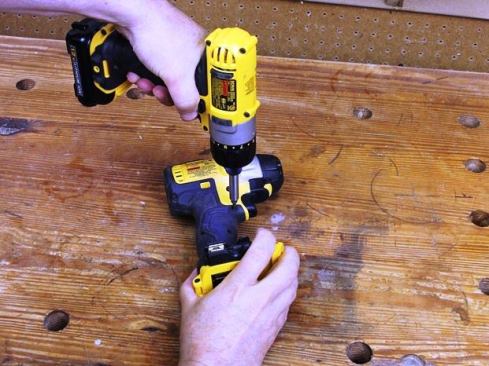 Remove Torx screws that hold clamshell housing halves together.