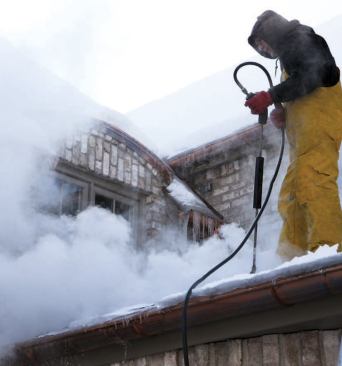 The crews use commercial-grade steamers to cut ice into chunks that can be safely tossed to the ground.