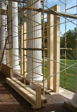 To temporarily support the porch roof while the columns were replaced, the carpenters built posts from 10-foot-long 2x4s and 2x6s.