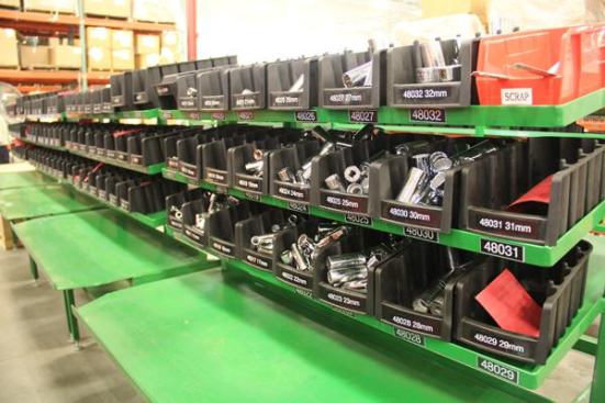 Finished pieces are stored in bins until they are needed—to be packaged separately or in blow-molded kit cases with ratchets and additional sockets and accessories.