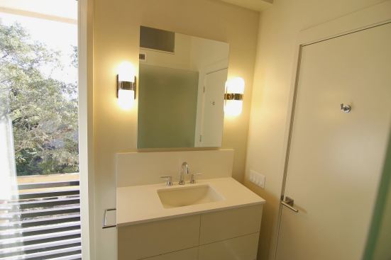 I love how the recessed med cabinet looks like a typical wall hung mirror. It's flush with the drywall.