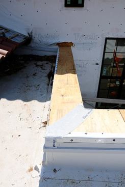 Anytime we have a 90 degree turn in a cap I want a good membrane at these critical junctions. Tyvek Flexwrap is what I use.