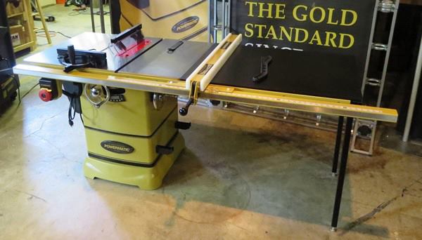This is the larger version of the saw; it has a wide extension table and can rip up to 52” to the right of the blade.