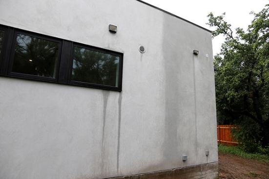 I took these pictures after a rain event and it’s pretty clear how the stucco is absorbing water! I’m glad I’ve got a nice air gap behind there so it can dry harmlessly