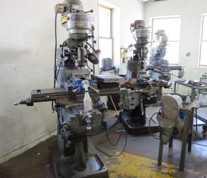 Lie-Nielsen’s shop contains a mix of old, new, low-tech, and high-tech machines. These are some old Bridgeport milling machines.