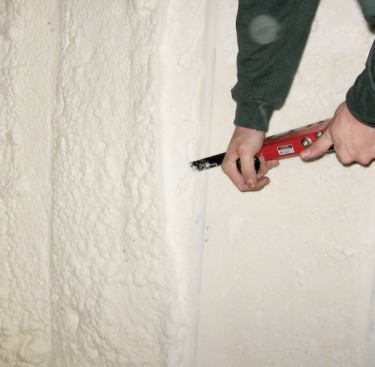 Depending on the R-value required, open-cell foam can be applied to a depth greater than the framing before being trimmed back flush.
