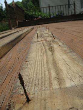 Fastener corrosion can also be a problem in older decks. Here the nail shanks had rusted through, allowing the decking to lift away from the framing.