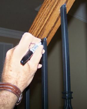 A black Sharpie pen is handy for touching up any exposed epoxy at the tops of the balusters.