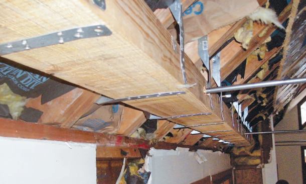Part of the beam is in the exterior soffit and part of it is inside the 20-foot box bay.