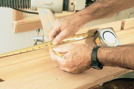 Measure an inside corner by hooking the tape over the long point.