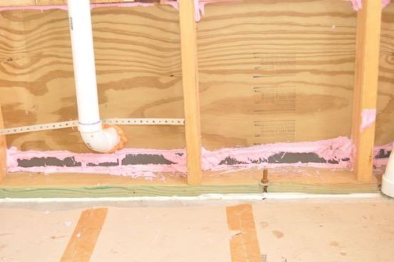 Owens Corning’s Energy Complete system includes a pink goo that’s a cross between spray foam and latex caulk. It is a good way to get a lower blower-door score.