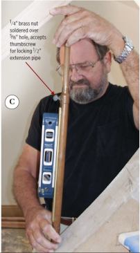 I drill a 5/16-inch-diameter hole through the reducer and tubing, grind the area flat around the hole, and then solder a 1/4-inch brass nut in place so that it is centered over the hole. This nut receives a 1/4-inch-diameter wing screw for locking the upper, extendable pipe in place.