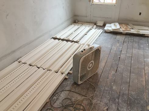 Our plaster sub makes crown molding on site in 3- to 4-foot sections.