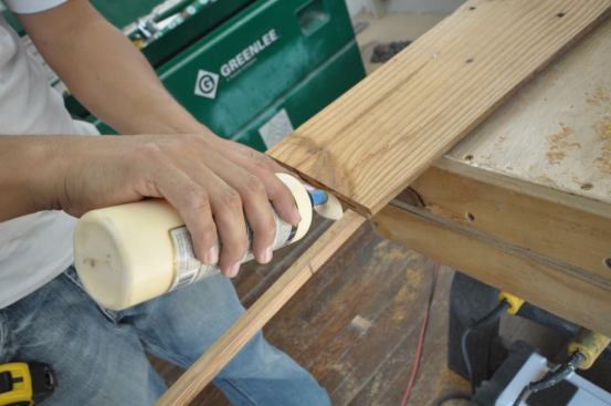 Titebond 2 is our favorite wood glue. My guys keep a 16oz bottle in their tool belts at all times. Glue is the secret to joints not opening up over time. Use it liberally in your wood wall installations (or any finish carpentry project for that matter).
